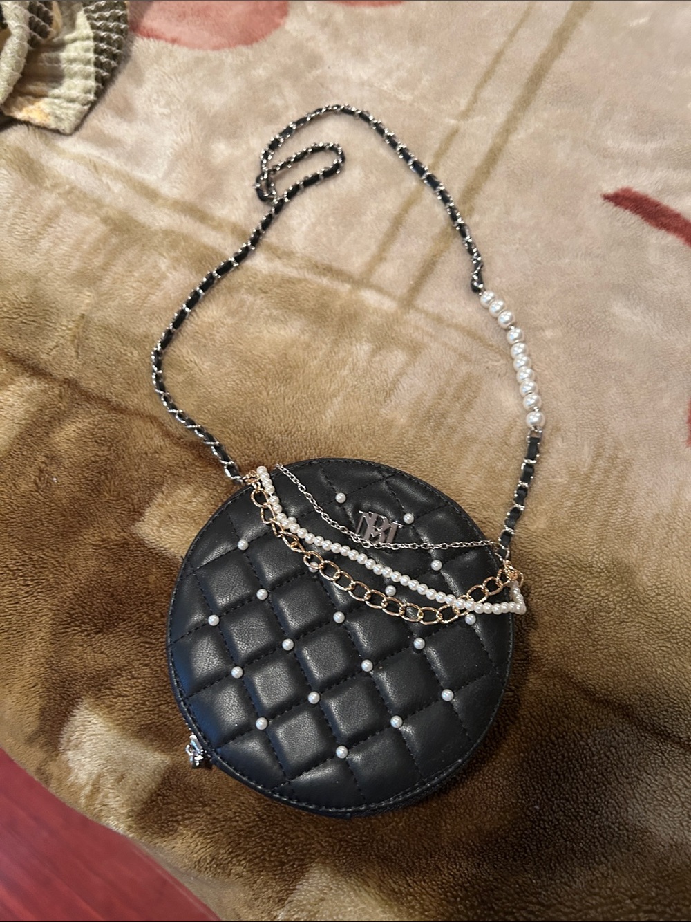 Quilted Round Pearl-Accent Crossbody Bag in Black